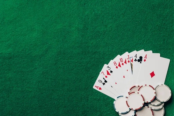 satu olxtoto Caribbean Stud Poker table with live dealer and five-card hands displayed